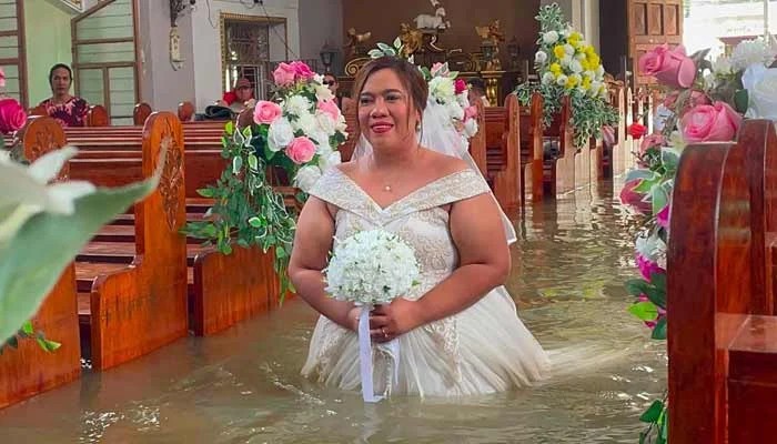 High Tides and White Brides: Philippine Couple Marries in Waist-Deep Floodwaters