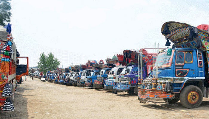 Rolling Stops: Transporters park heavy demands on highway as strike rolls on