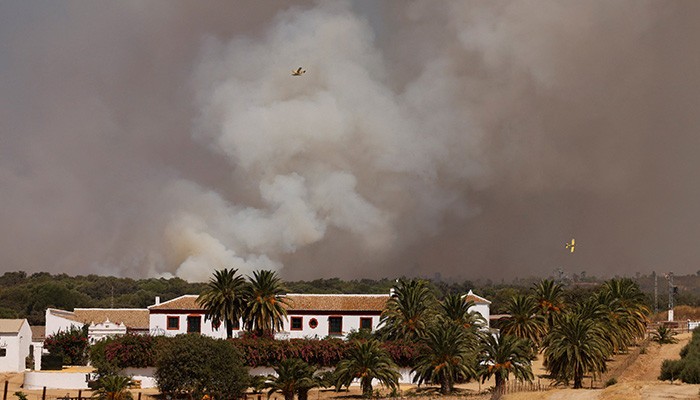 Spain removes remains of 11th century kings from monastery as wildfire rages