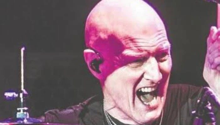 Beat goes quiet: Former AC/DC drummer Chris Slade retires at 79
